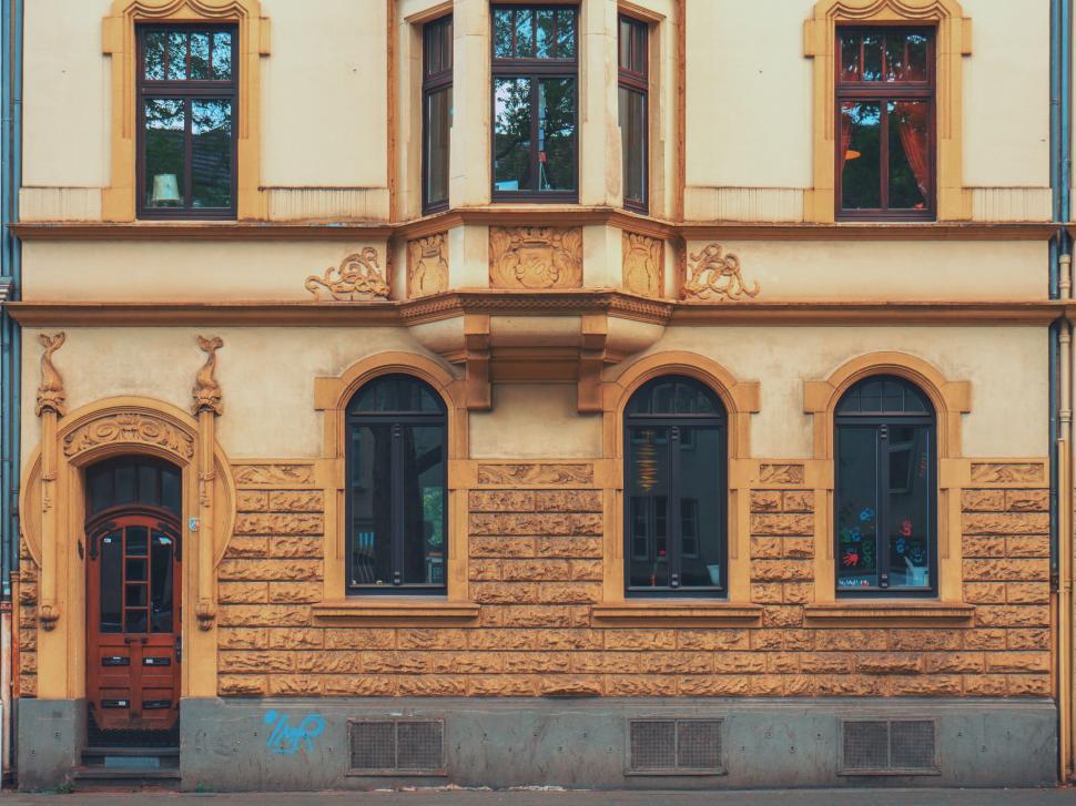 Free Image of Old Building With Red Fire Hydrant 
