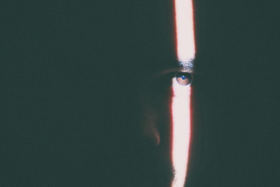 Free Image of Close Up of Persons Face in the Dark 