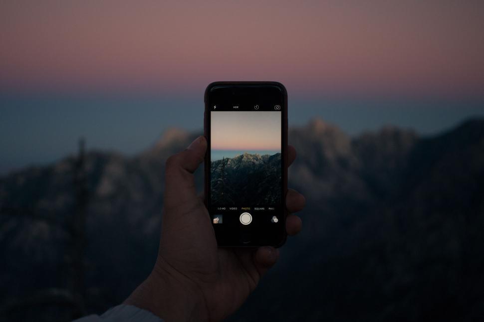 Free Image of Person Taking a Picture With a Cell Phone 