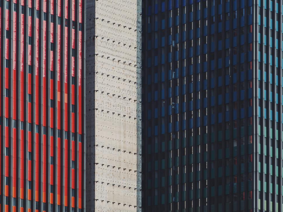 Free Image of Two Tall Buildings Standing Side by Side 