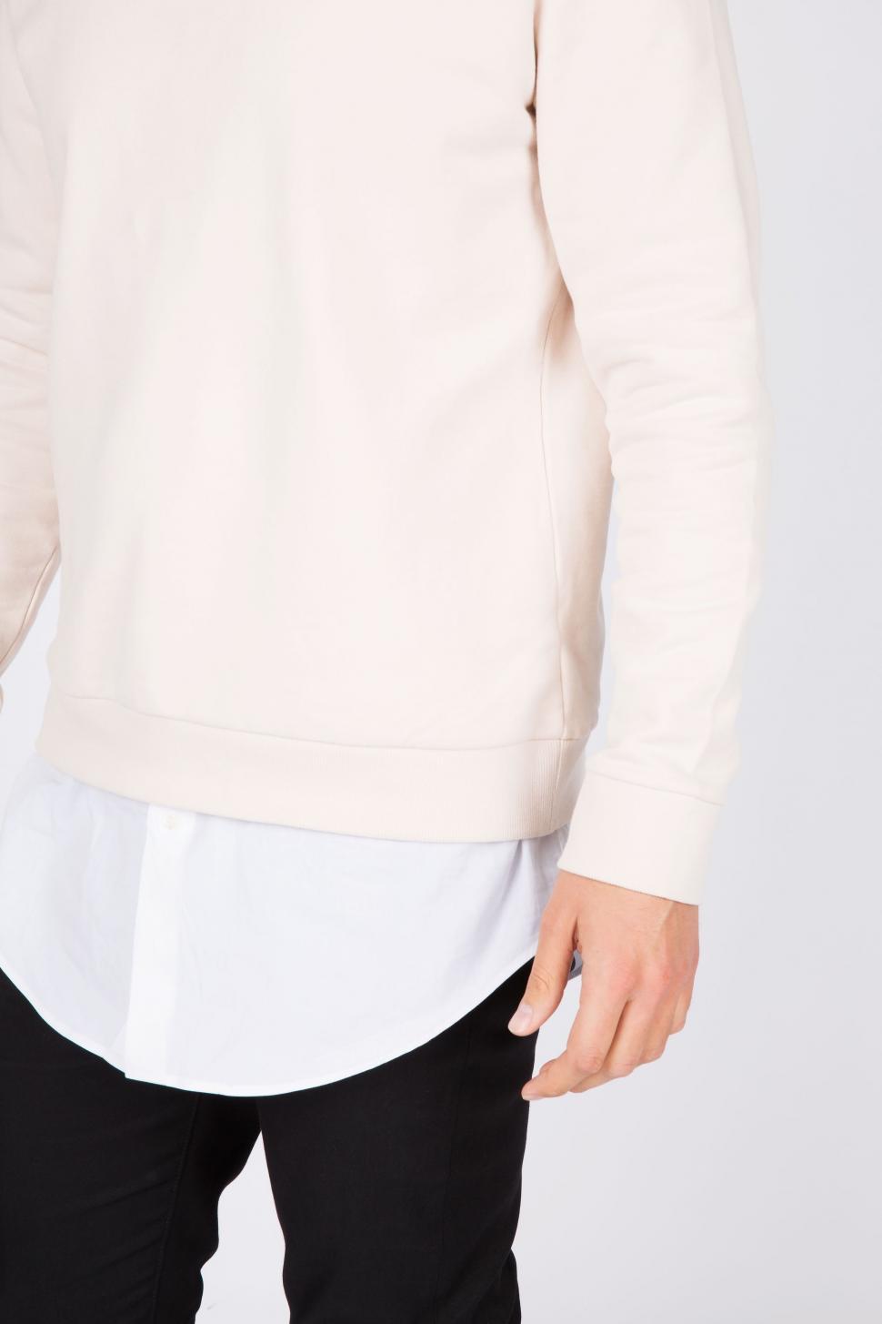 Free Image of Man Wearing White Sweater and Black Pants 