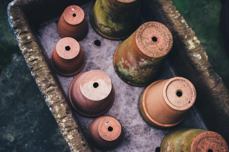Free Image of Group of Clay Pots on Table 