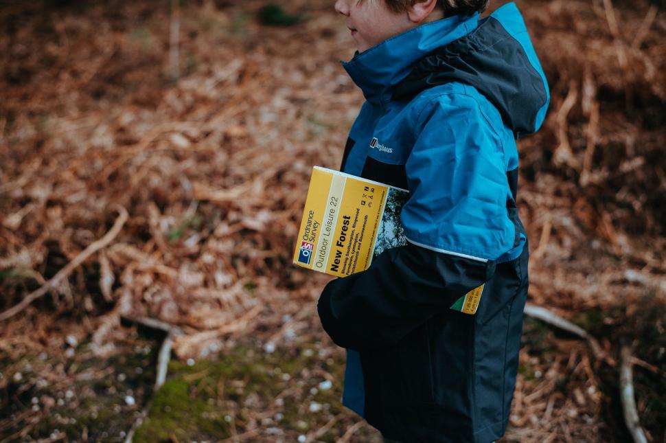 Free Image of Young Boy in Blue Jacket and Black Pants 