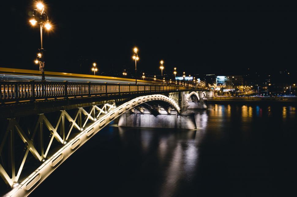 Free Image of Bridge Over Water at Night 