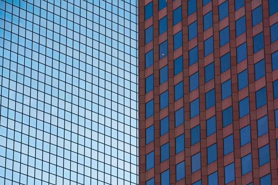 Free Image of Tall Red and Blue Buildings in Urban Setting 