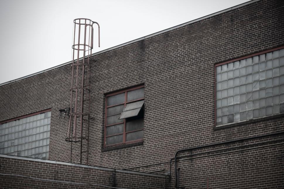 Free Image of Brick Building Facade in Black and White 