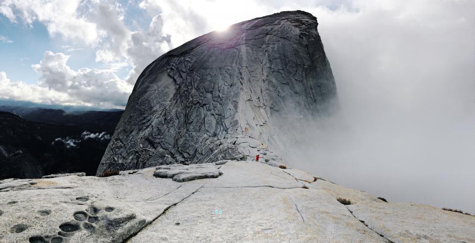 Free Image of Large Rock With Footprints in Mountain 