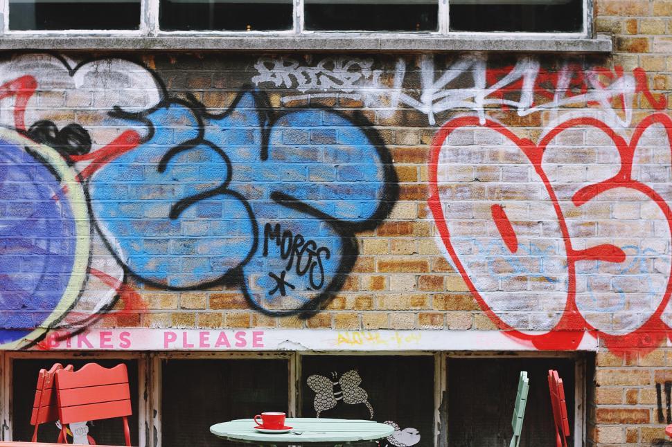 Free Image of Graffiti-Adorned Brick Building 