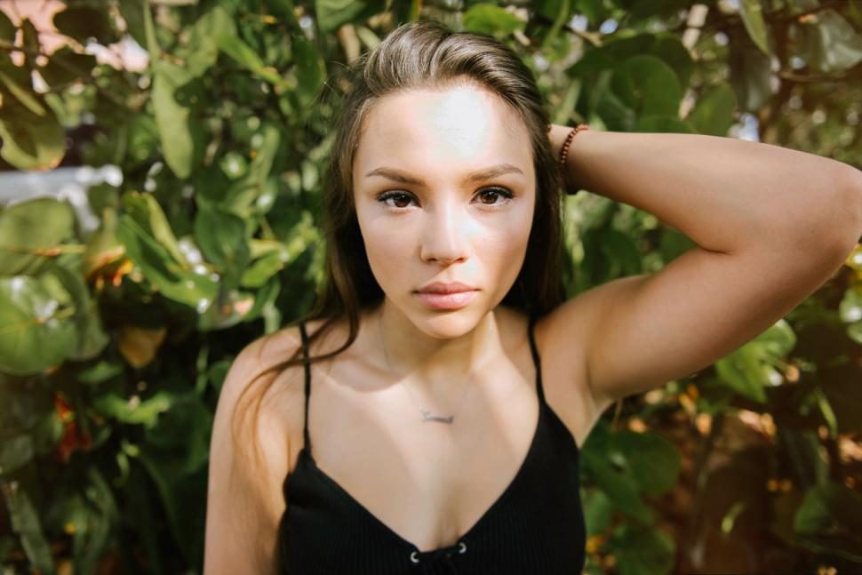 Free Image of Woman Posing in Black Top 