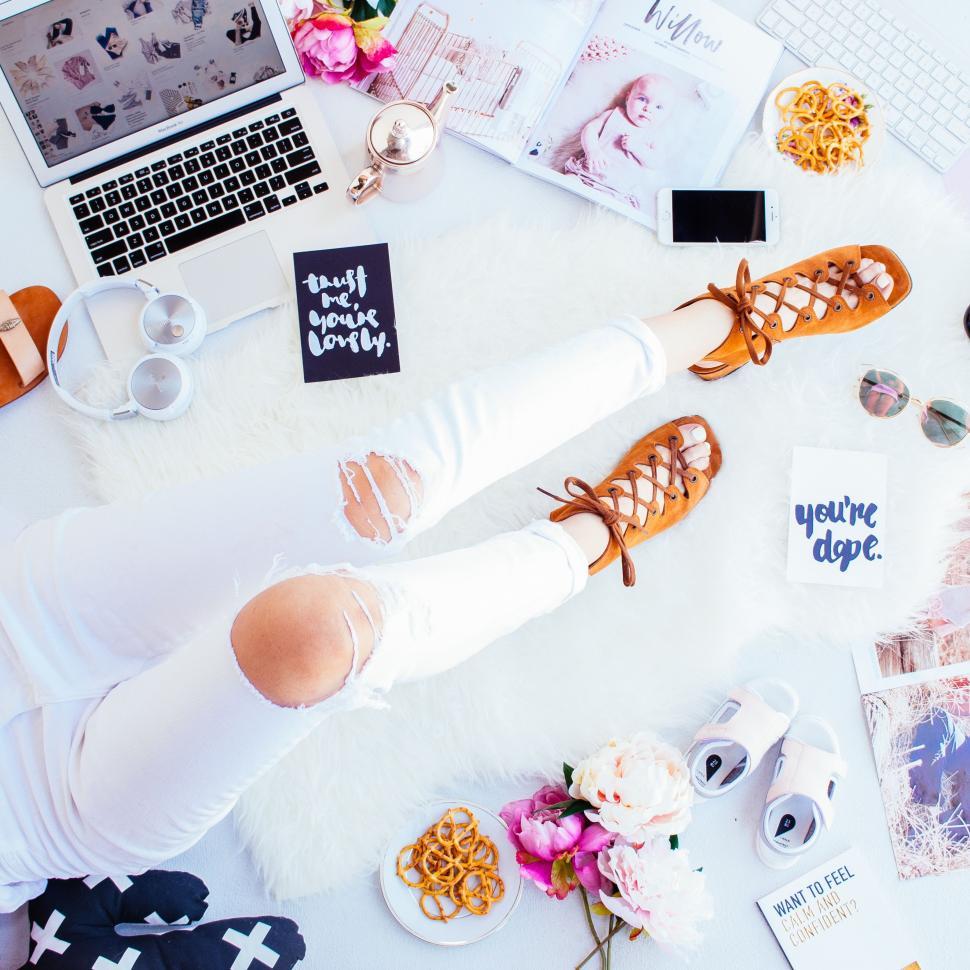 Free Image of White Table With Laptop Computer and Doll 