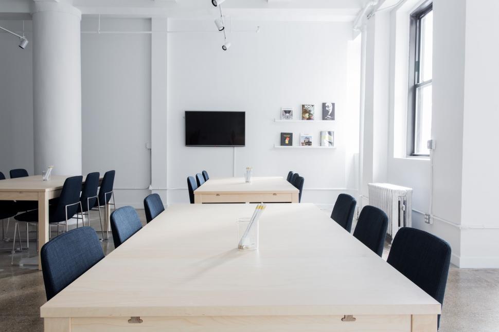 Free Image of Room With Long Table and Chairs 