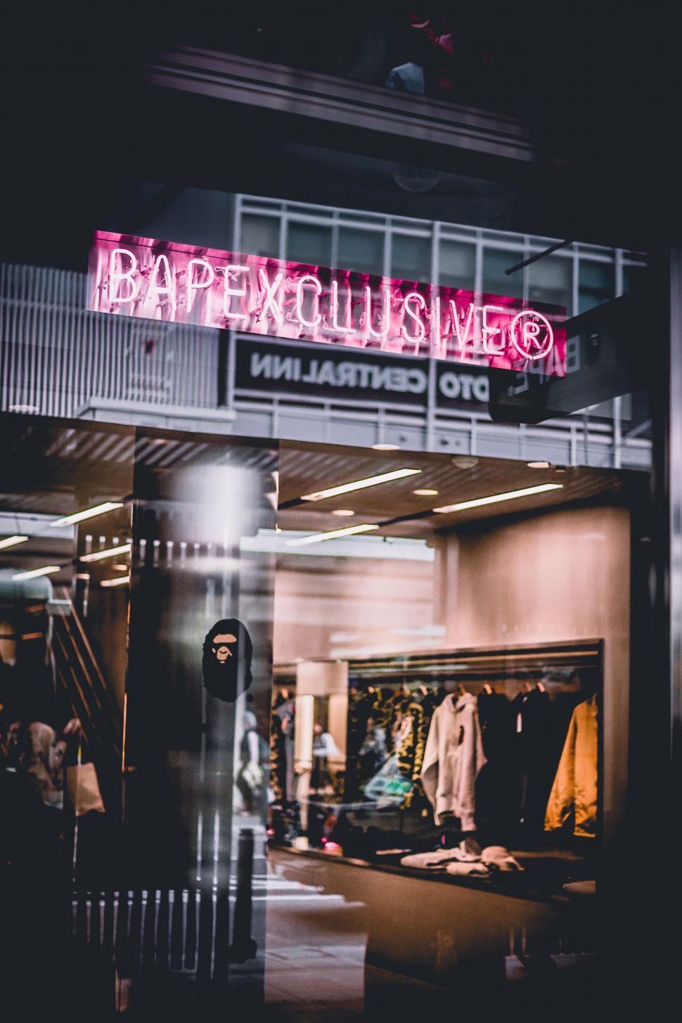 Free Image of Neon Sign Above Store Front 