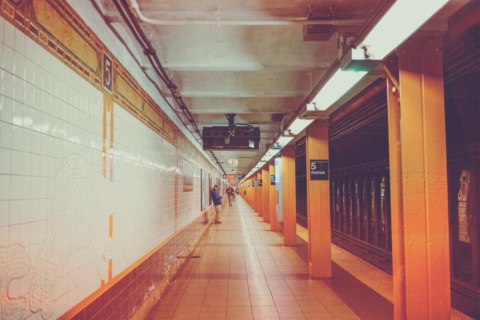 Free Image of Long Hallway With Yellow and White Walls 