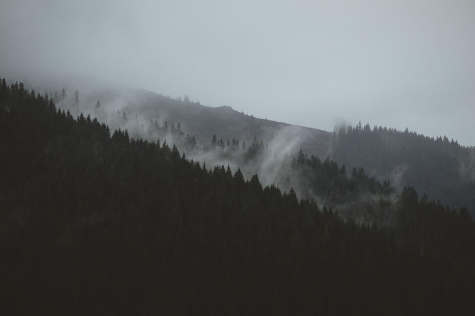 Free Image of Mountain Covered in Fog 