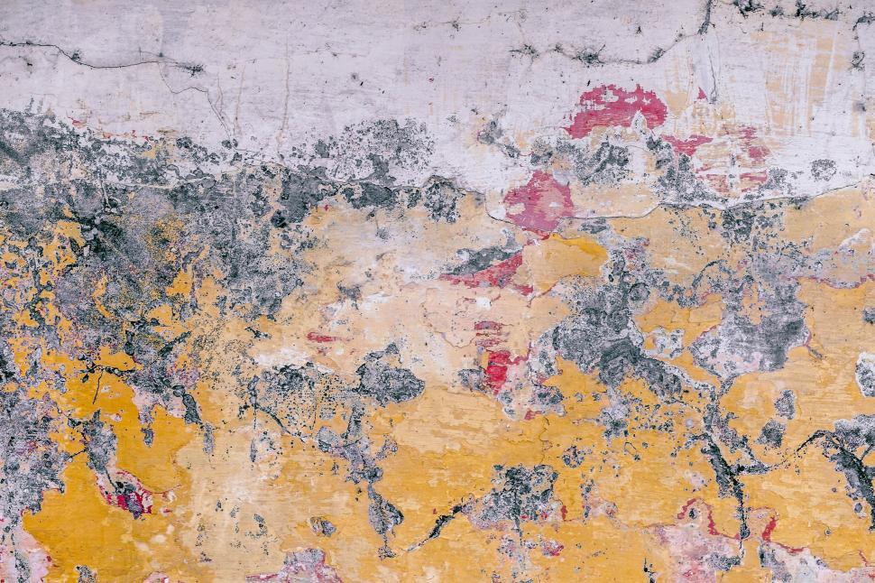 Free Image of Yellow and Gray Wall With Black and White Paint 