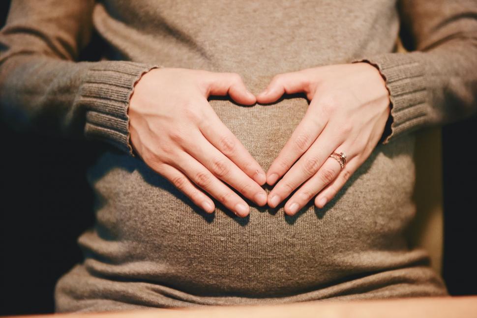 Free Image of Person Making Heart Shape With Hands 