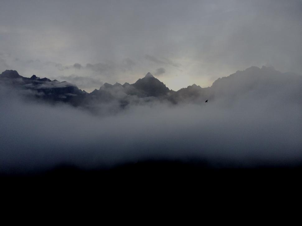 Free Image of Clouds and Mountains in Black and White 
