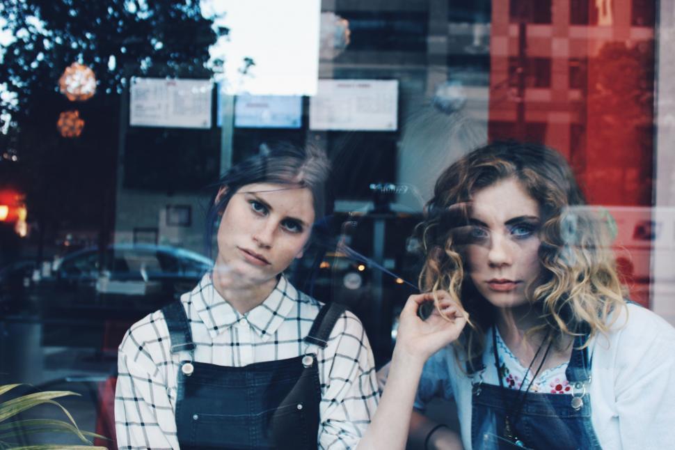 Free Image of Two Women Standing Together 