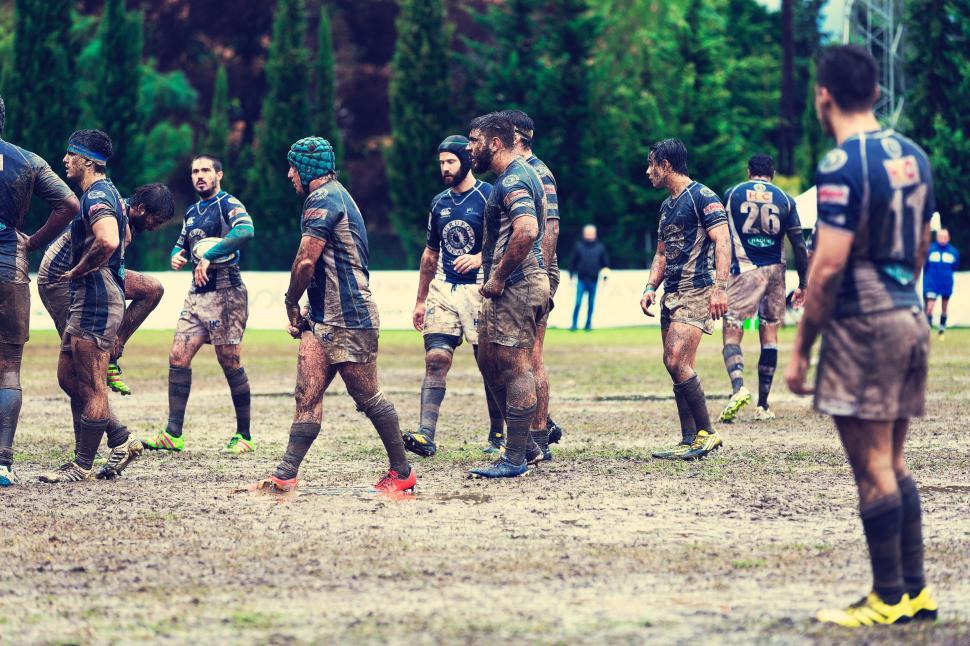 Free Image of Group of Men Playing a Game of Soccer 