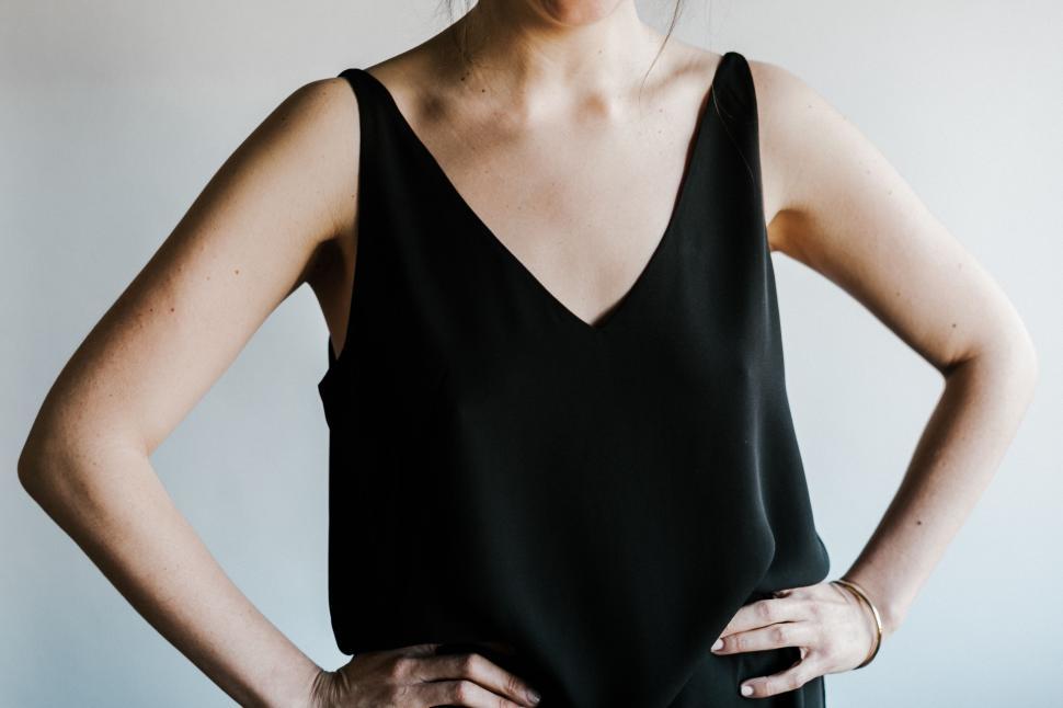 Free Image of Woman Standing With Hands on Hips 