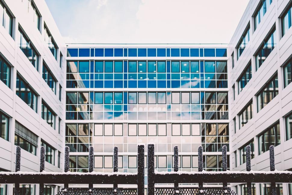 Free Image of Towering Building With Numerous Windows 