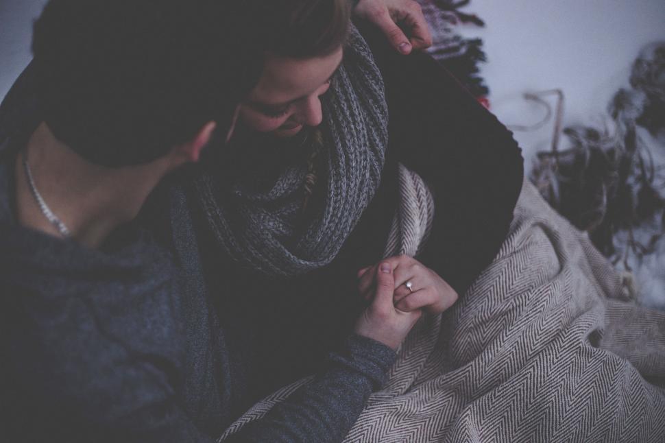 Free Image of Woman Wearing Scarf Around Her Neck 