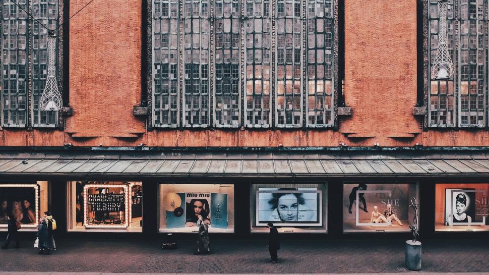 Free Image of Group of People Standing Outside of a Building 