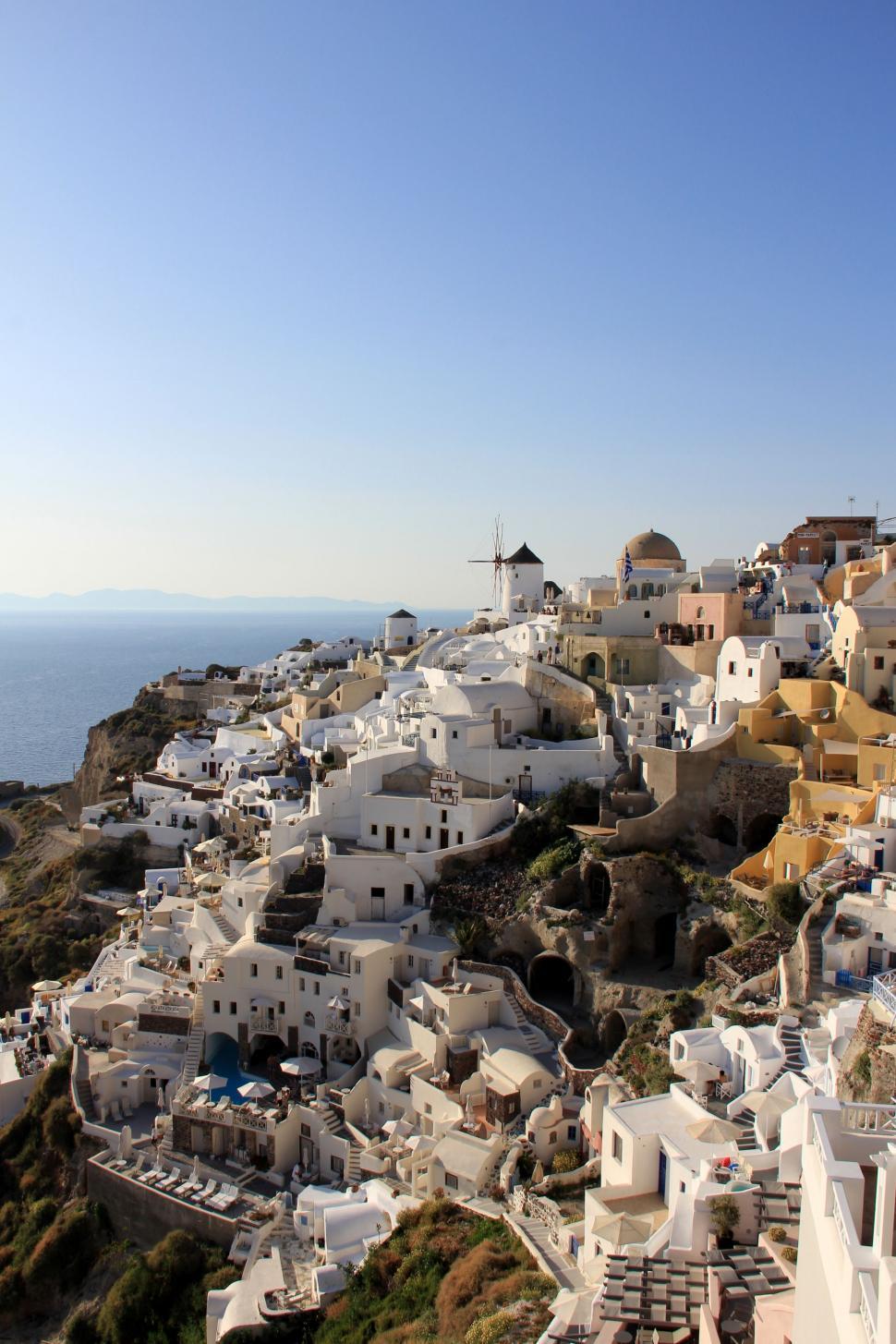 Free Image of Village on Cliff Overlooking Ocean 