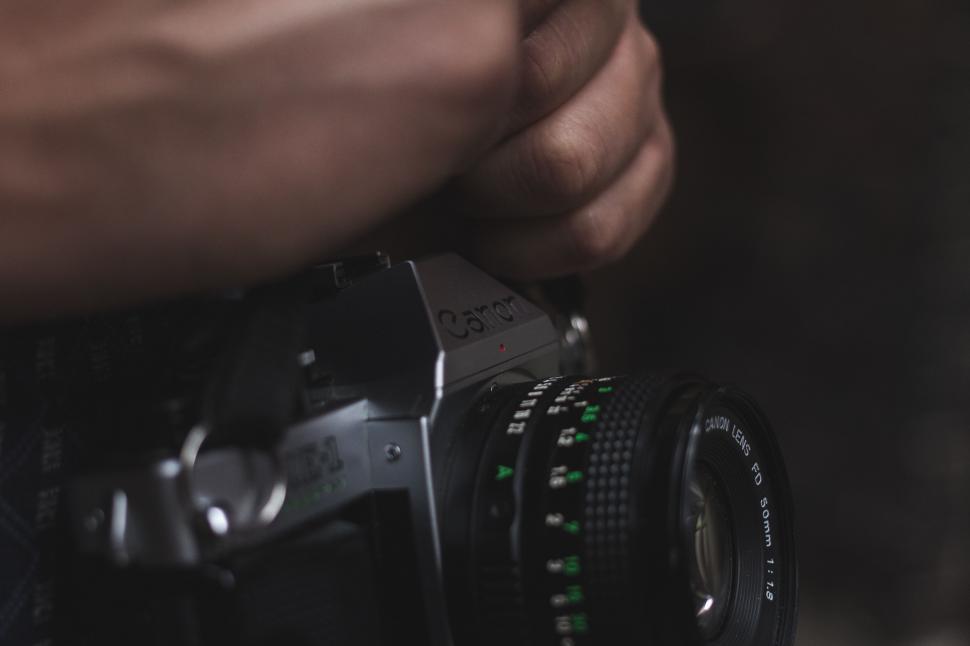 Free Image of Person Holding Camera 