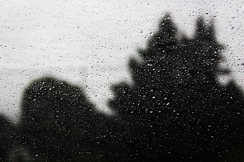 Free Image of Building Seen Through Rainy Window 