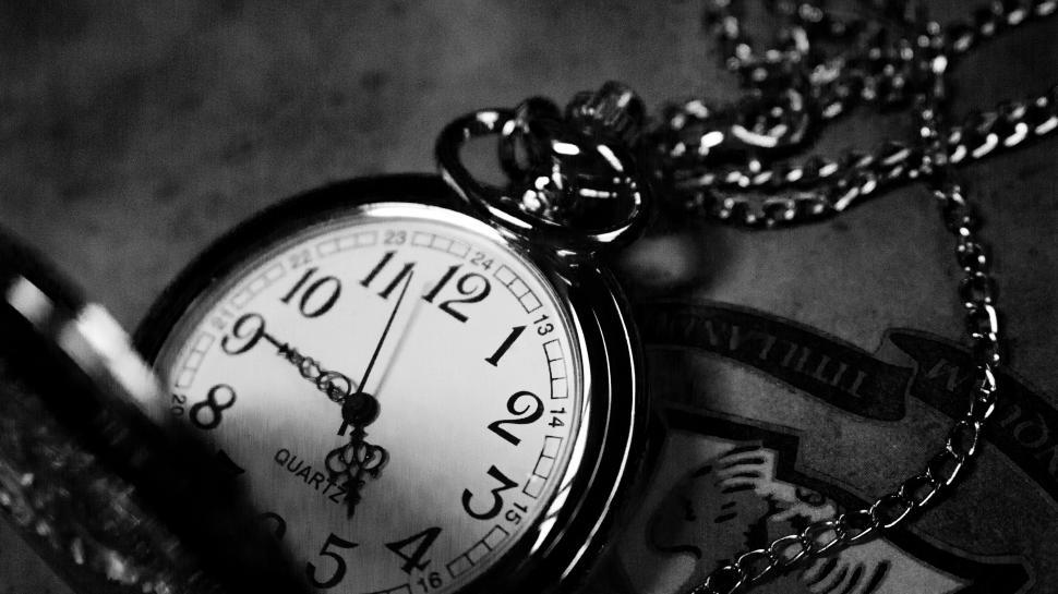 Free Image of Close Up of a Pocket Watch on a Chain 