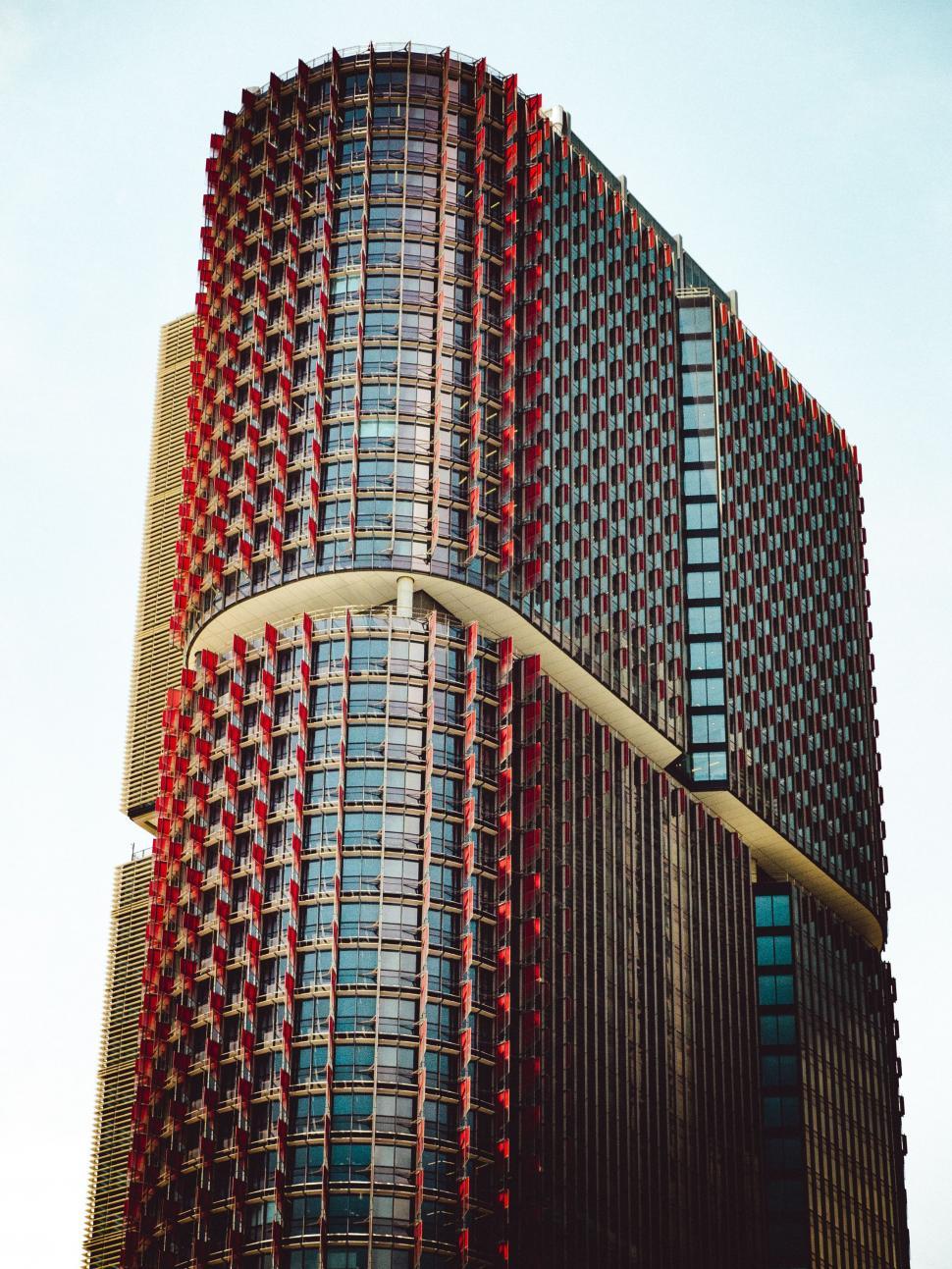 Free Image of Towering Skyscraper With Numerous Windows 