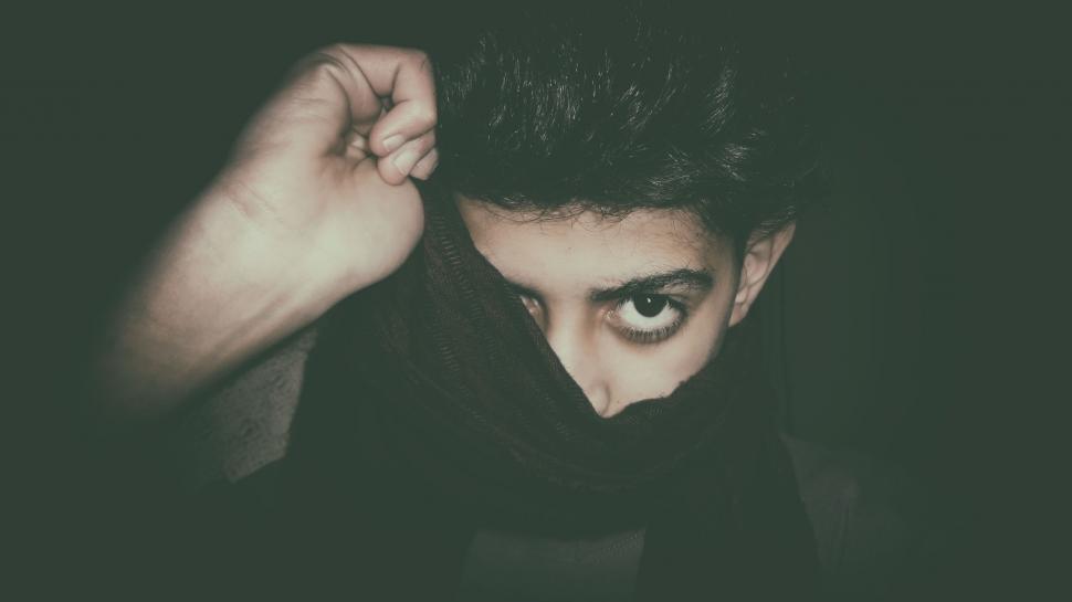 Free Image of Man Wearing Scarf Around His Neck 
