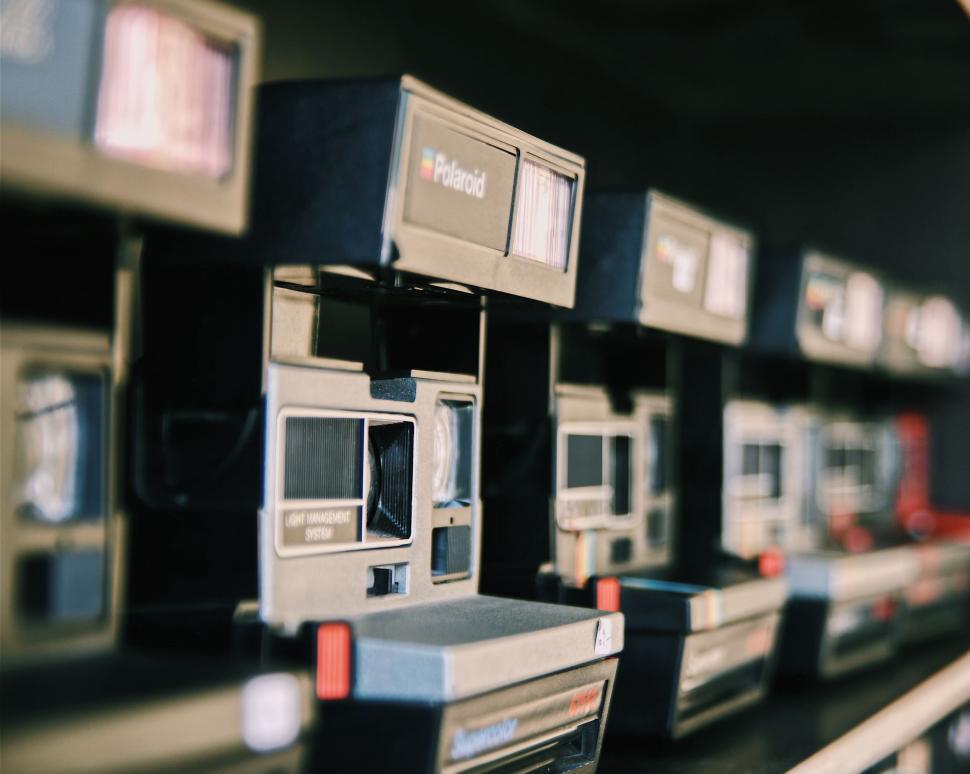Free Image of Row of Electronic Devices on Shelf 
