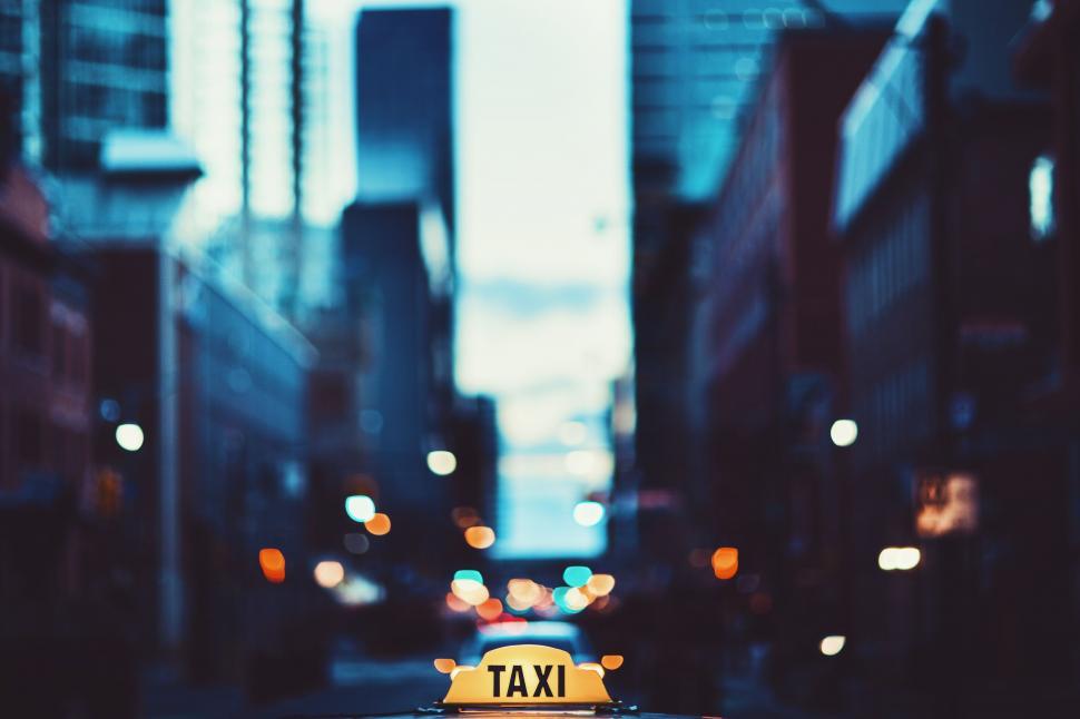 Free Image of Taxi Cab Stopped in Middle of Street 