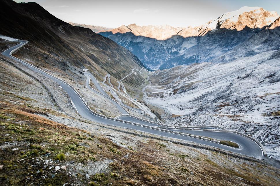 Free Image of A Winding Road in the Middle of a Mountain Range 