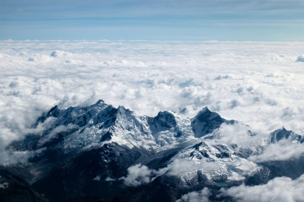 Free Image of A View of a Mountain Range From an Airplane 