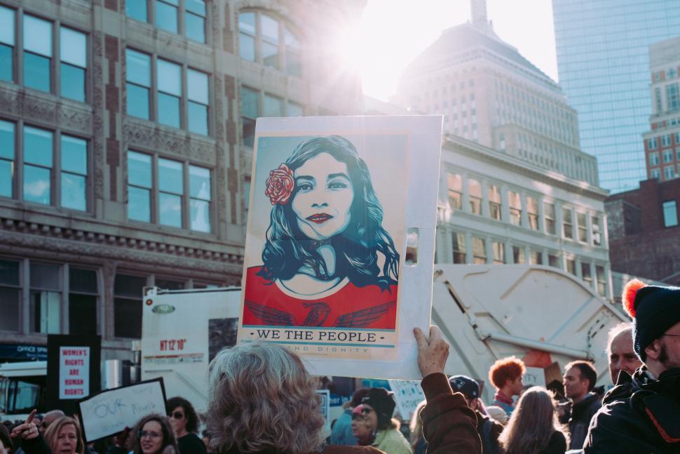 Free Image of Group of People Holding Signs in the Street 