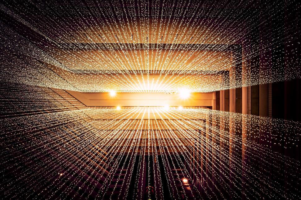 Free Image of A Large Room Filled With Lots of Lights 