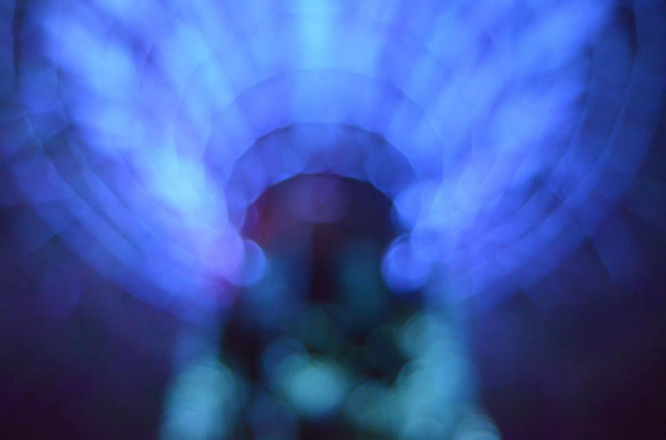 Free Image of Blurry Person Wearing Hat 