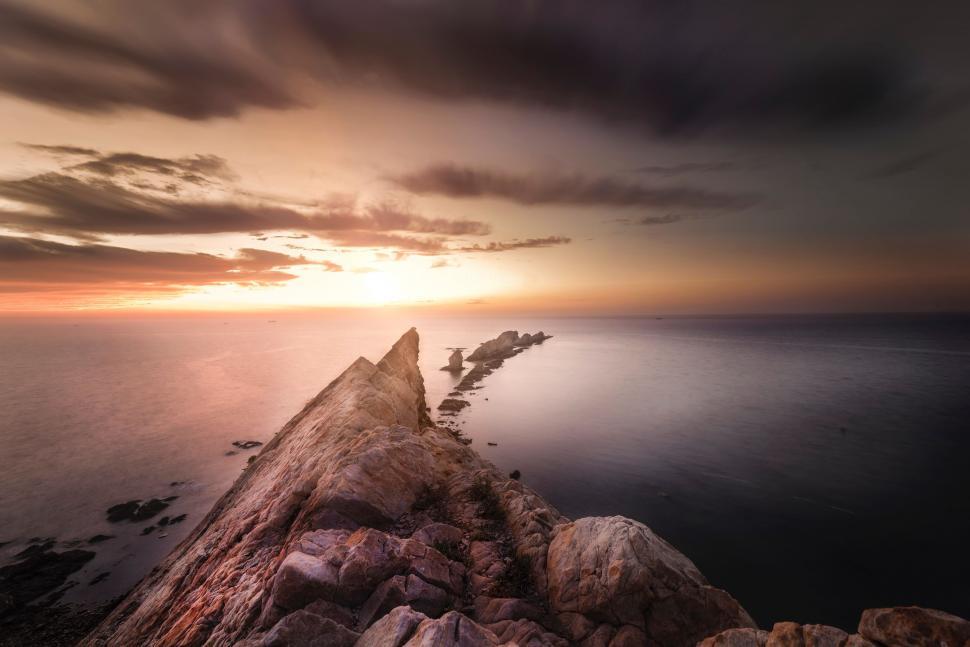 Free Image of Sunset Over Ocean Long Exposure 