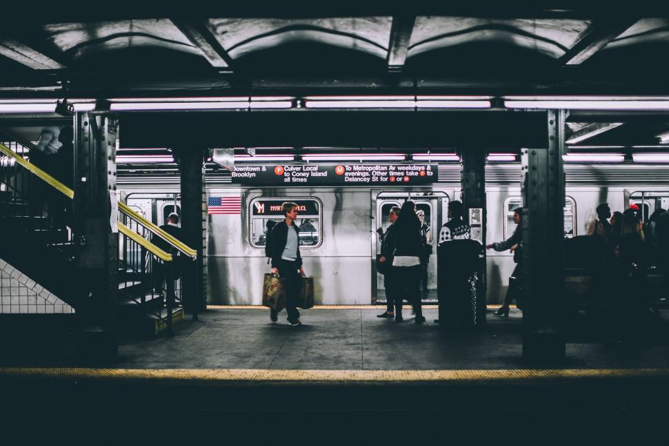 Free Image of Group of People Standing on Subway Platform 