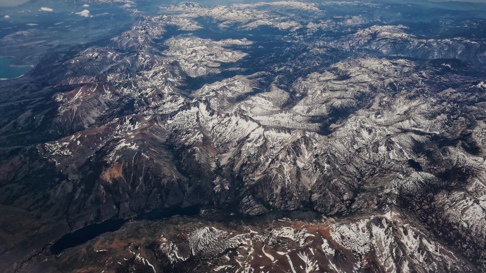 Free Image of A Panoramic View of a Mountain Range From an Airplane 