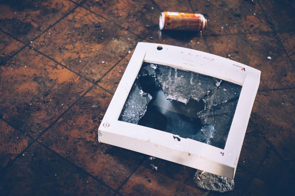 Free Image of Broken Picture Frame on Ground 