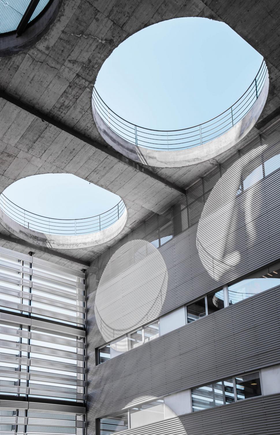 Free Image of Building With Three Circular Windows and Skylight 