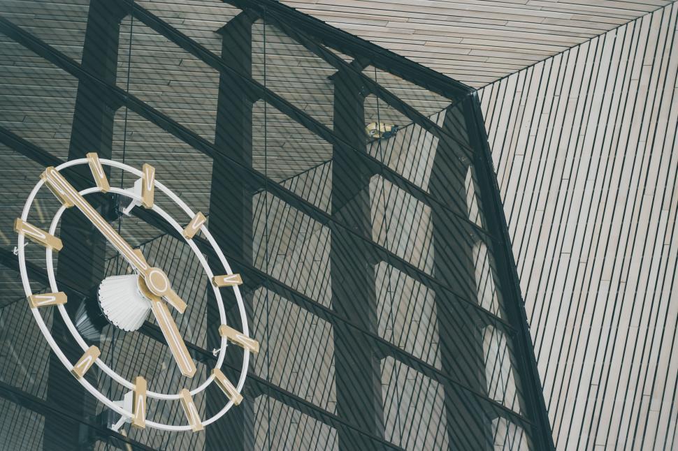 Free Image of Clock on Building Facade 