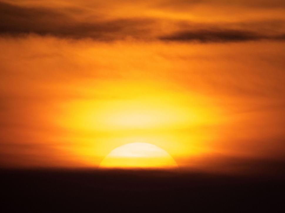 Free Image of Plane Flying in the Sky at Sunset 