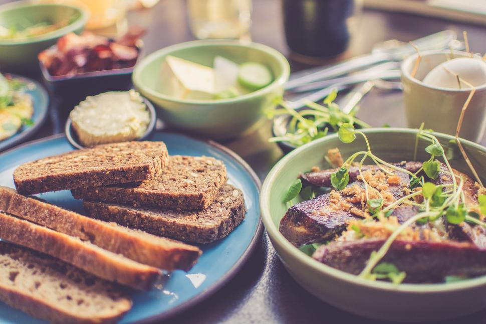 Free Image of Table Set With Plates of Food and Bowls of Food 