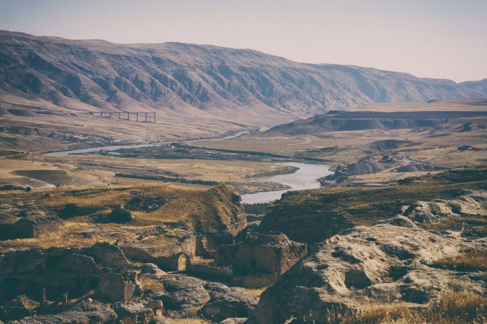Free Image of A View of a Valley With a Bridge 