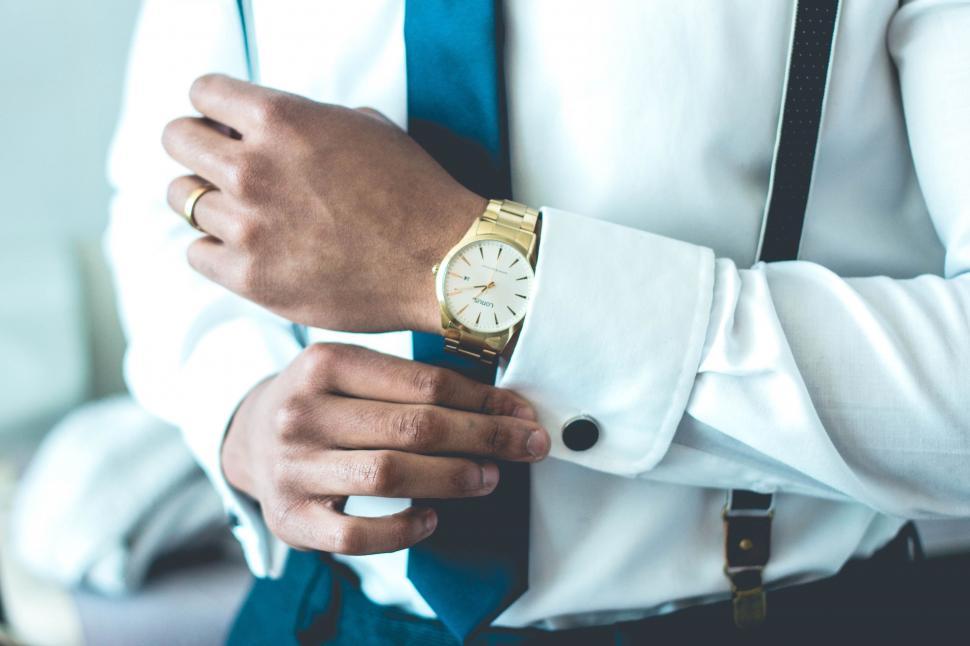 Free Image of Man Wearing White Shirt and Blue Tie 
